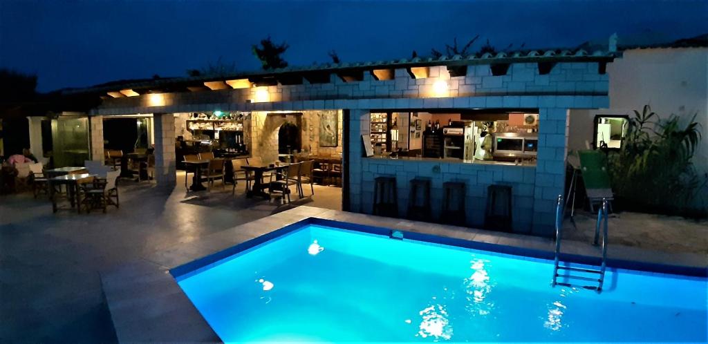 The swimming pool at or close to Irides
