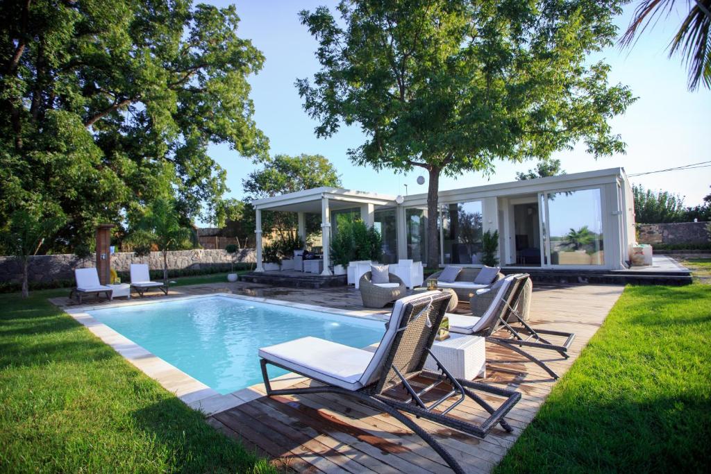 The swimming pool at or close to T Villa