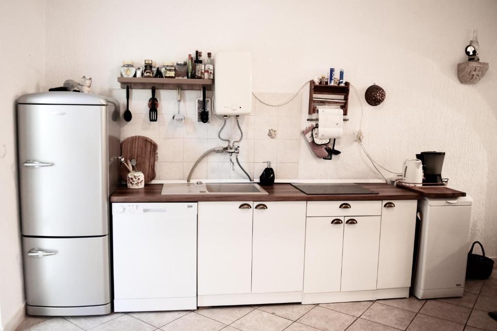 Kuchyň nebo kuchyňský kout v ubytování House Nada