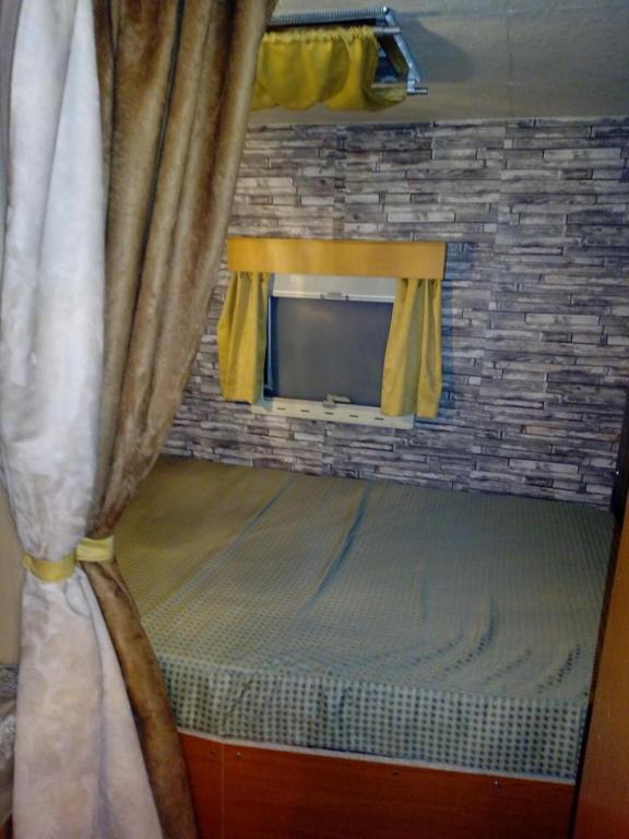 Postel nebo postele na pokoji v ubytování Camping Pitsoni