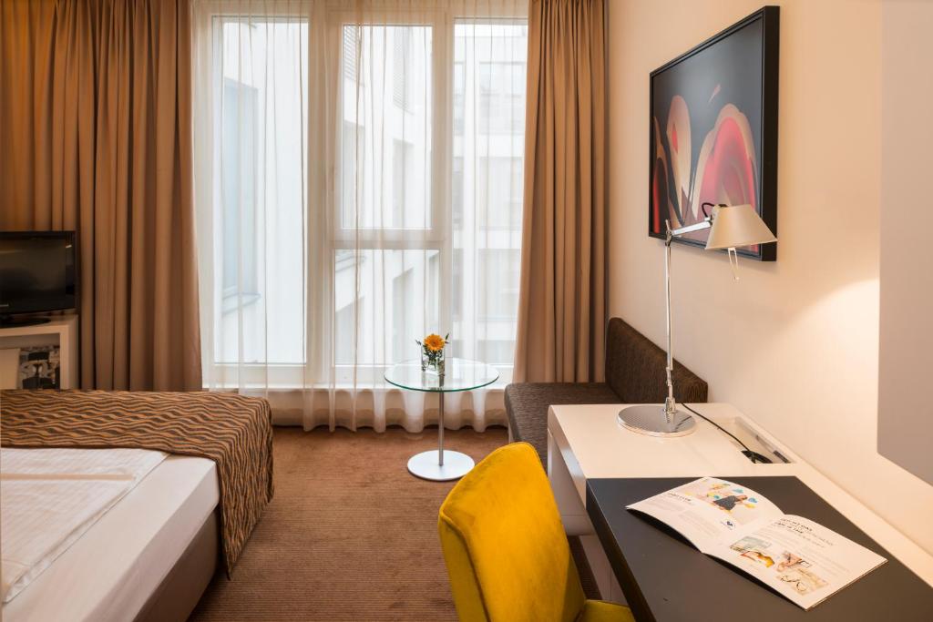 TV a/nebo společenská místnost v ubytování Falkensteiner Hotel Bratislava