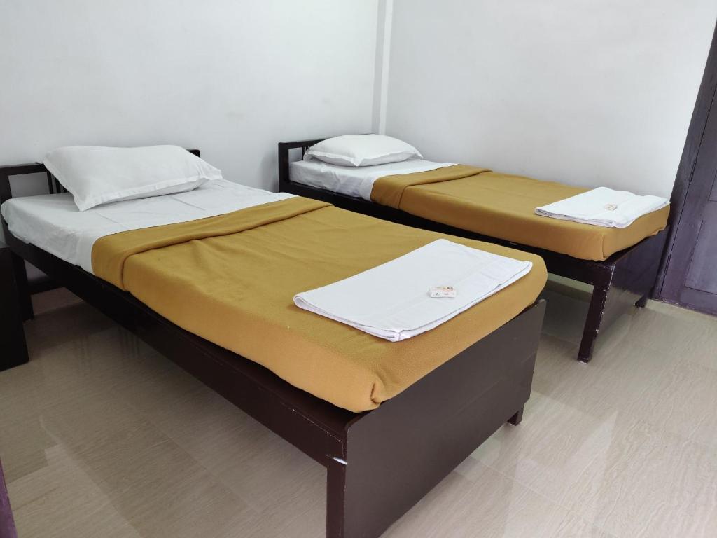 Postel nebo postele na pokoji v ubytování M3 Homes