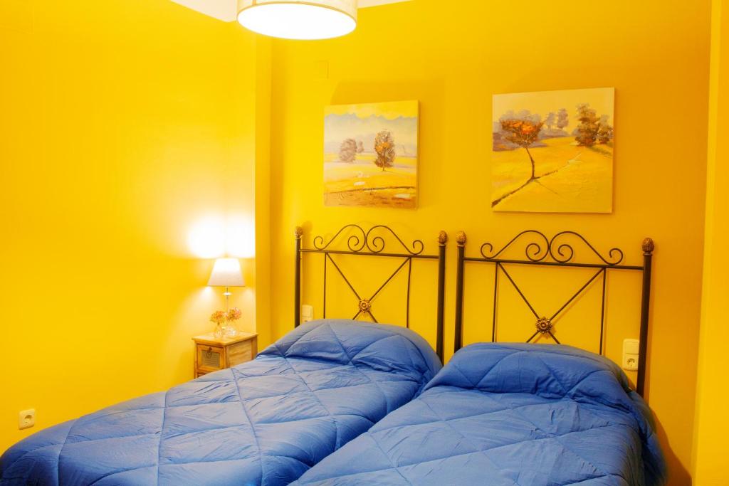 Posteľ alebo postele v izbe v ubytovaní Puerta Bubión Apartamentos