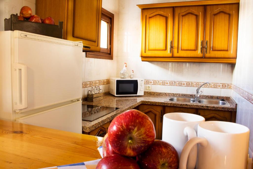 Kuchyňa alebo kuchynka v ubytovaní Puerta Bubión Apartamentos