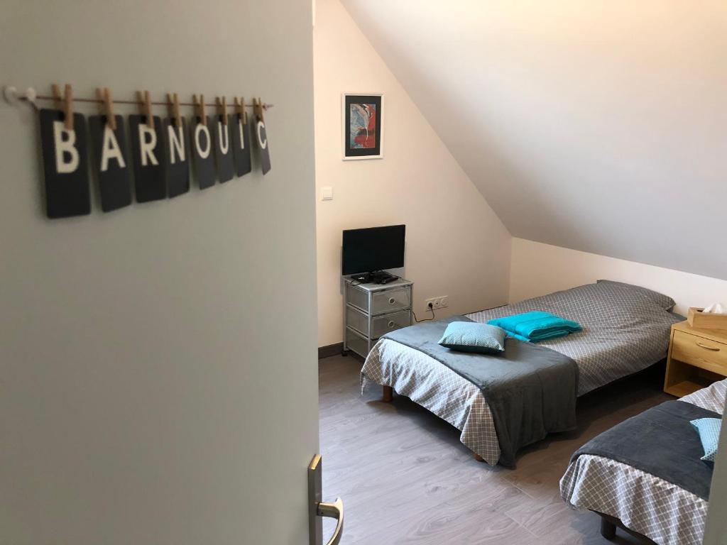 Postel nebo postele na pokoji v ubytování Chambres à BINIC
