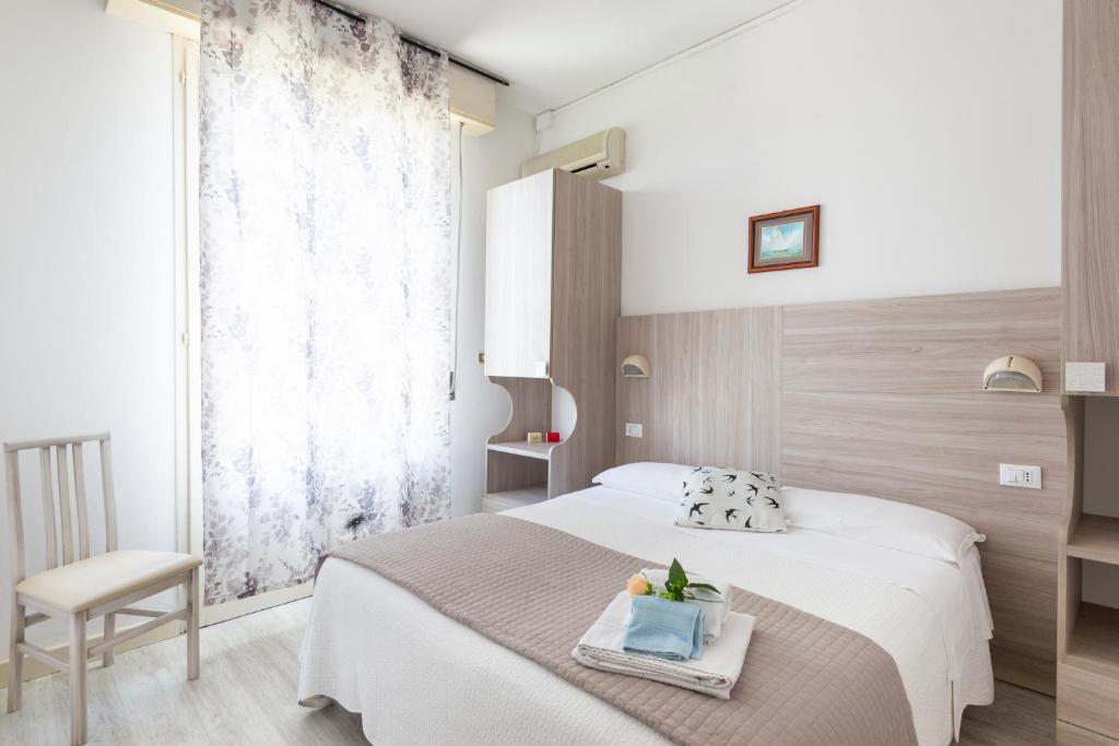 Postel nebo postele na pokoji v ubytování Hotel Verde Luna