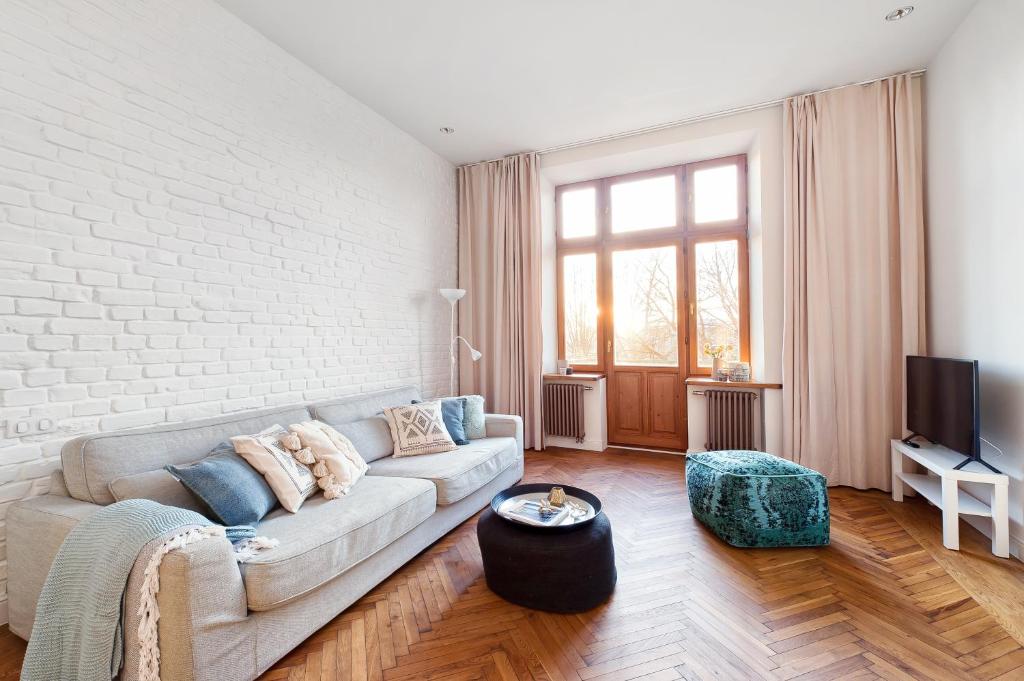 Televízia a/alebo spoločenská miestnosť v ubytovaní Dream Apartment - LoftAffair