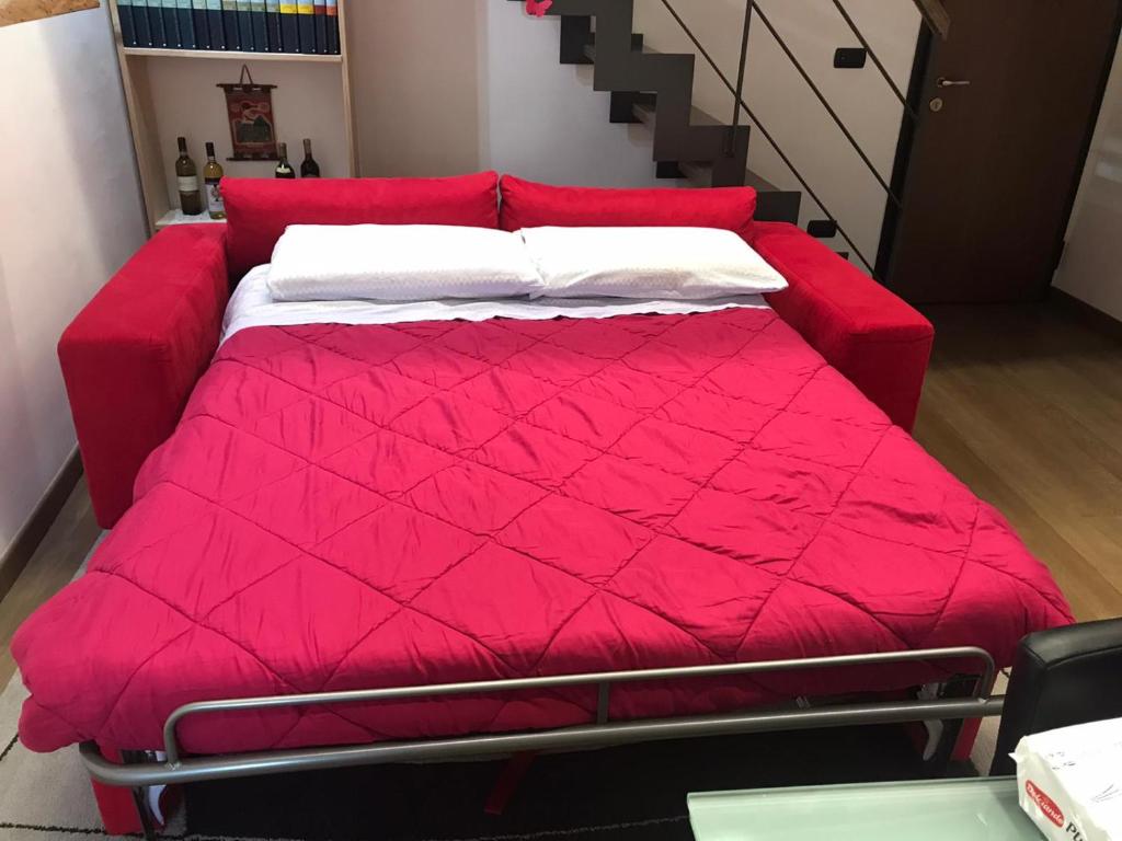 Posteľ alebo postele v izbe v ubytovaní B&B Il Dolce Dormire