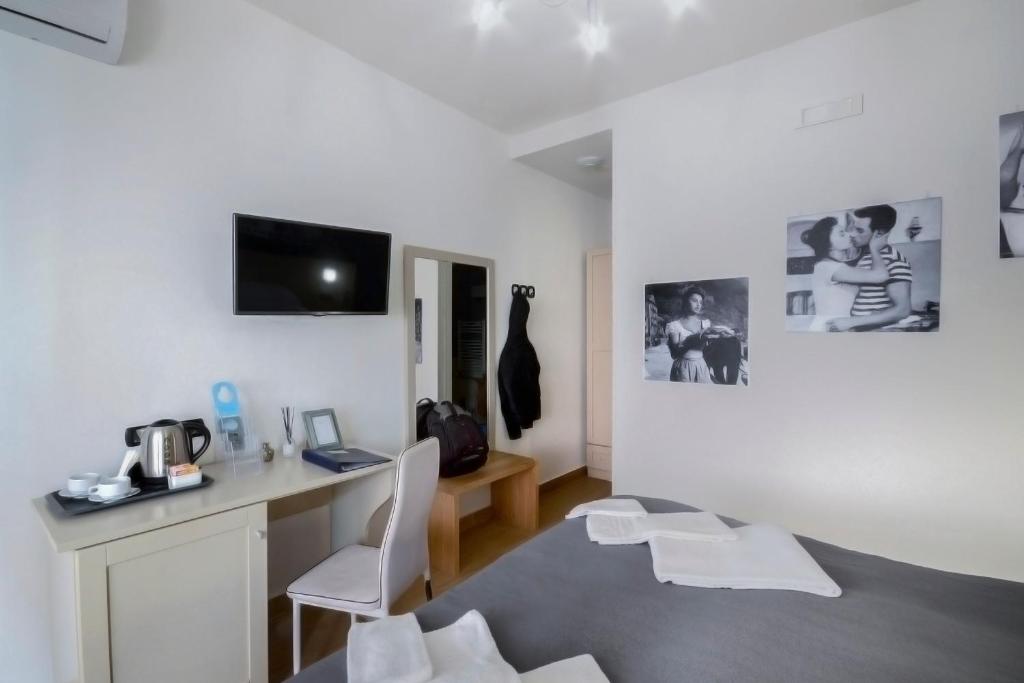 TV a/nebo společenská místnost v ubytování B&B Sorrento Queen