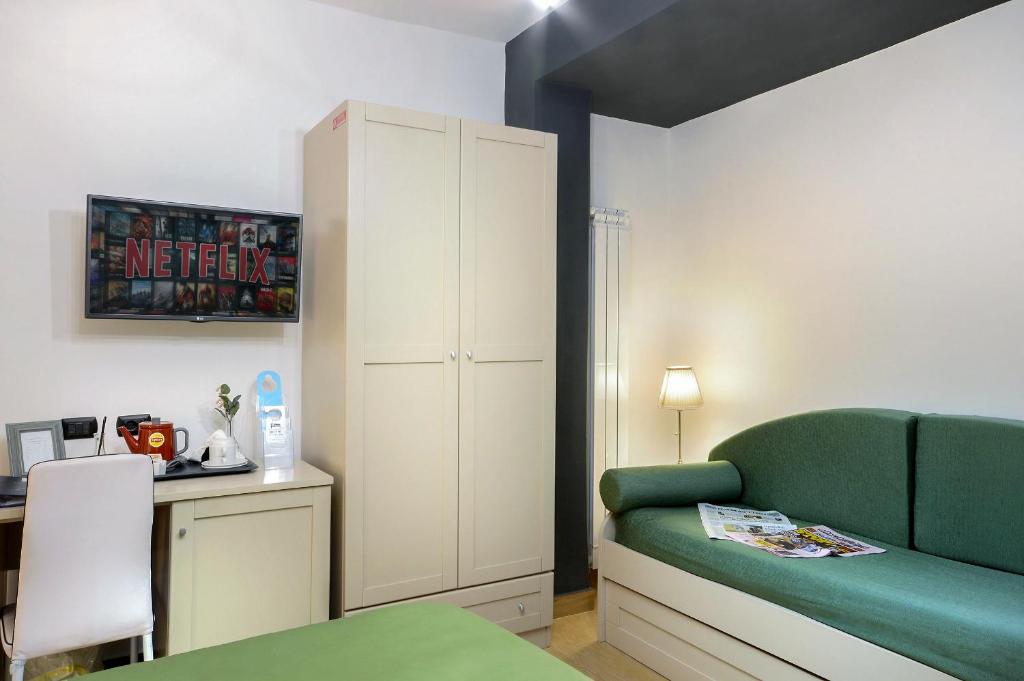 Postel nebo postele na pokoji v ubytování B&B Sorrento Queen