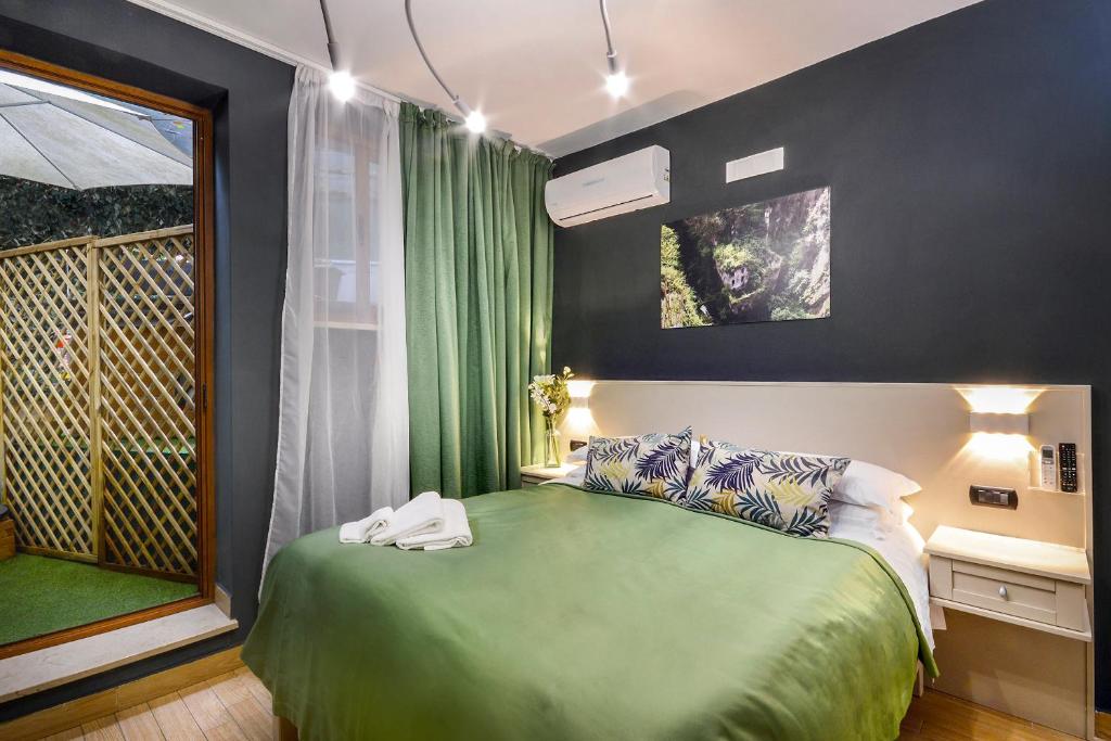 Postel nebo postele na pokoji v ubytování B&B Sorrento Queen