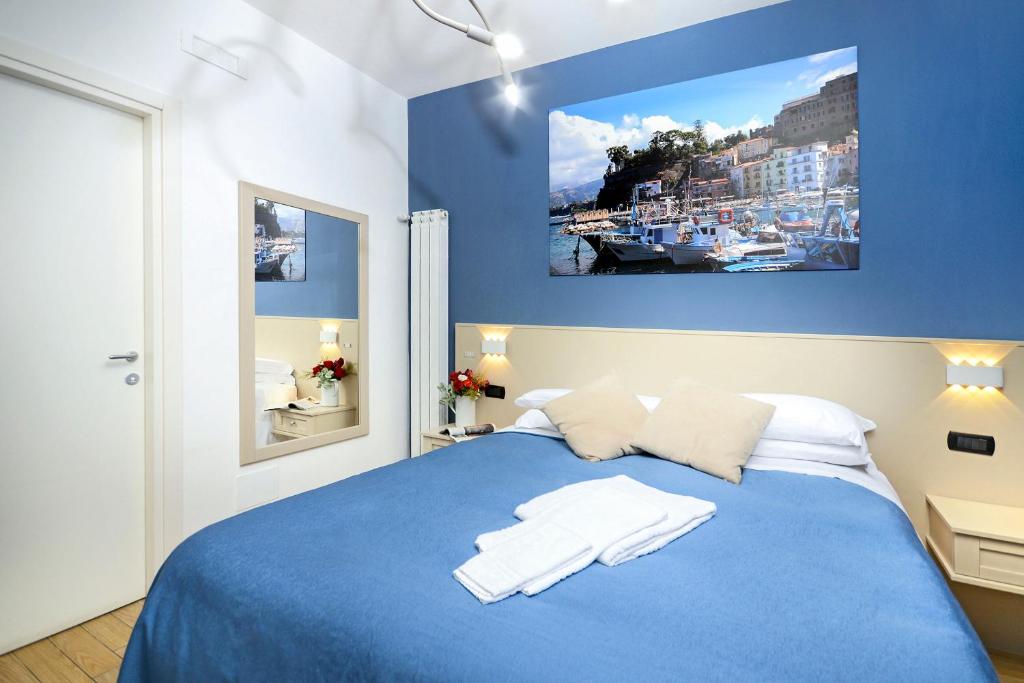 Postel nebo postele na pokoji v ubytování B&B Sorrento Queen