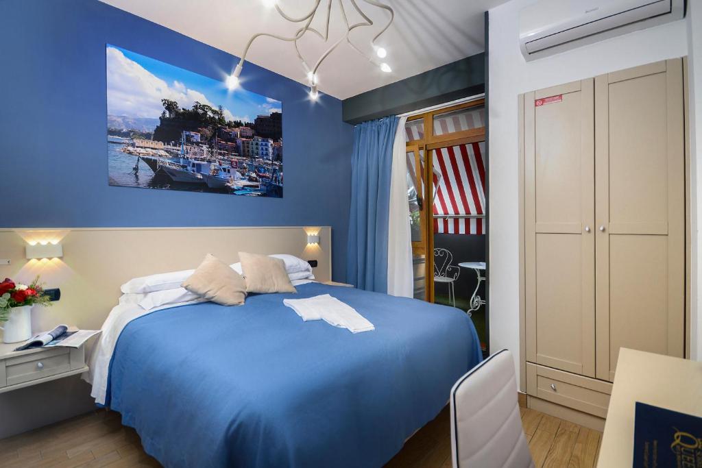 Postel nebo postele na pokoji v ubytování B&B Sorrento Queen