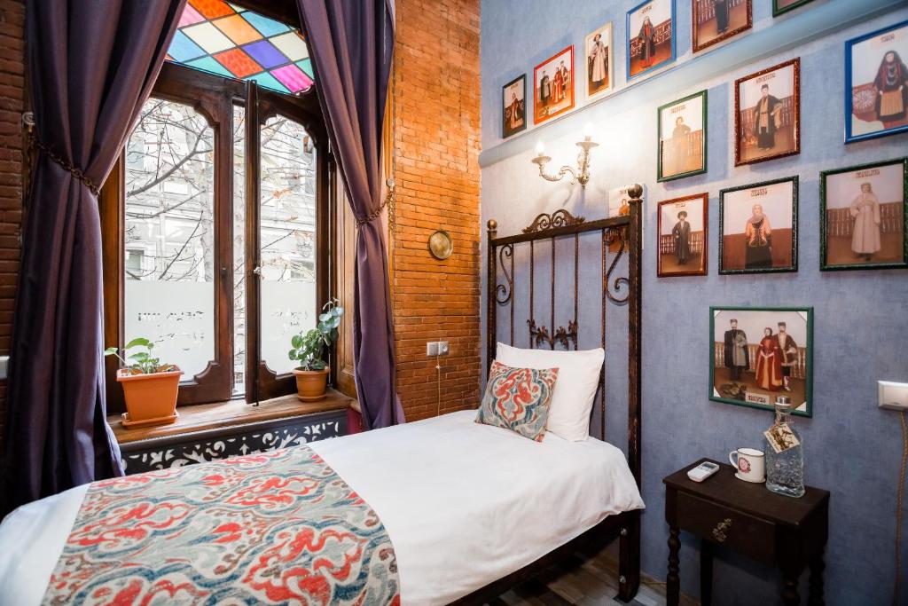 Krevet ili kreveti u jedinici u okviru objekta Tiflis Inn Boutique Hotel