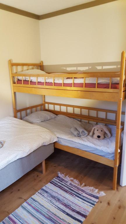 Postel nebo postele na pokoji v ubytování Spiragården