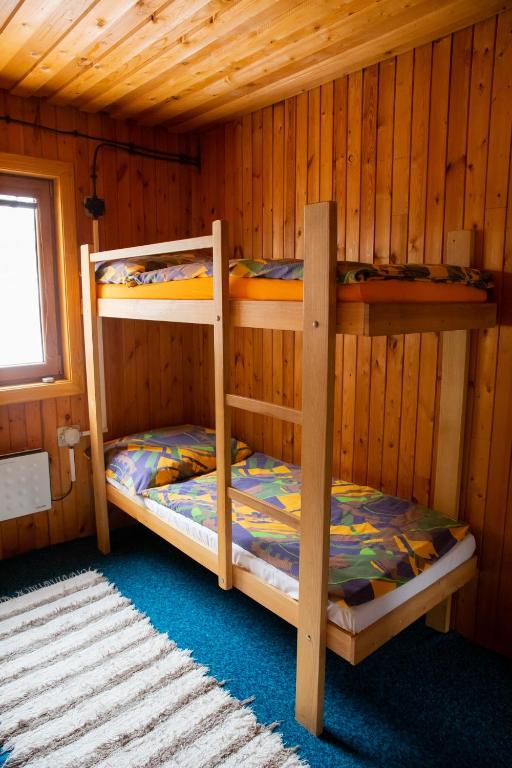 Postel nebo postele na pokoji v ubytování Chata Pohoda pri Jánošíku