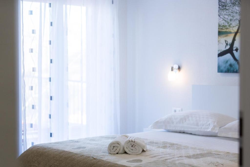 Posteľ alebo postele v izbe v ubytovaní Sedra Home