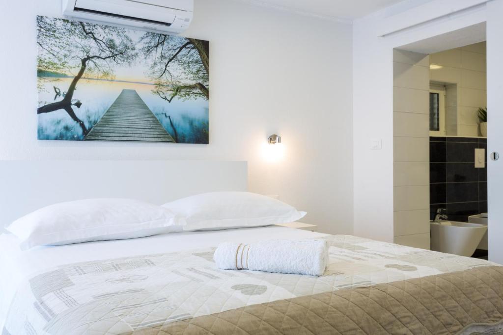 Posteľ alebo postele v izbe v ubytovaní Sedra Home