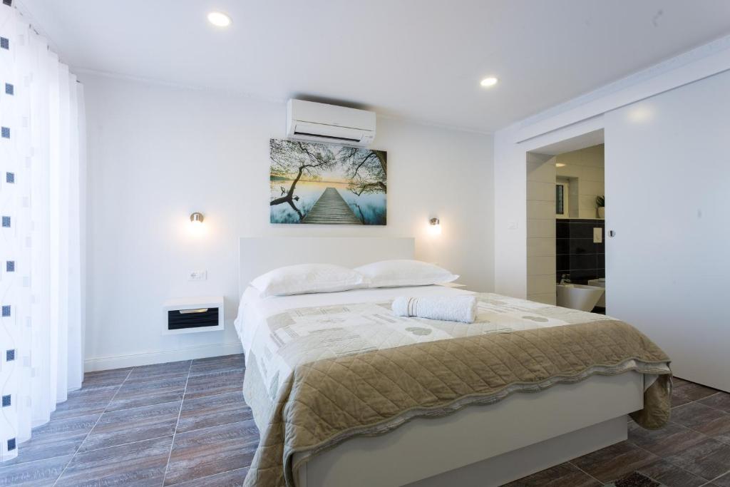 Posteľ alebo postele v izbe v ubytovaní Sedra Home