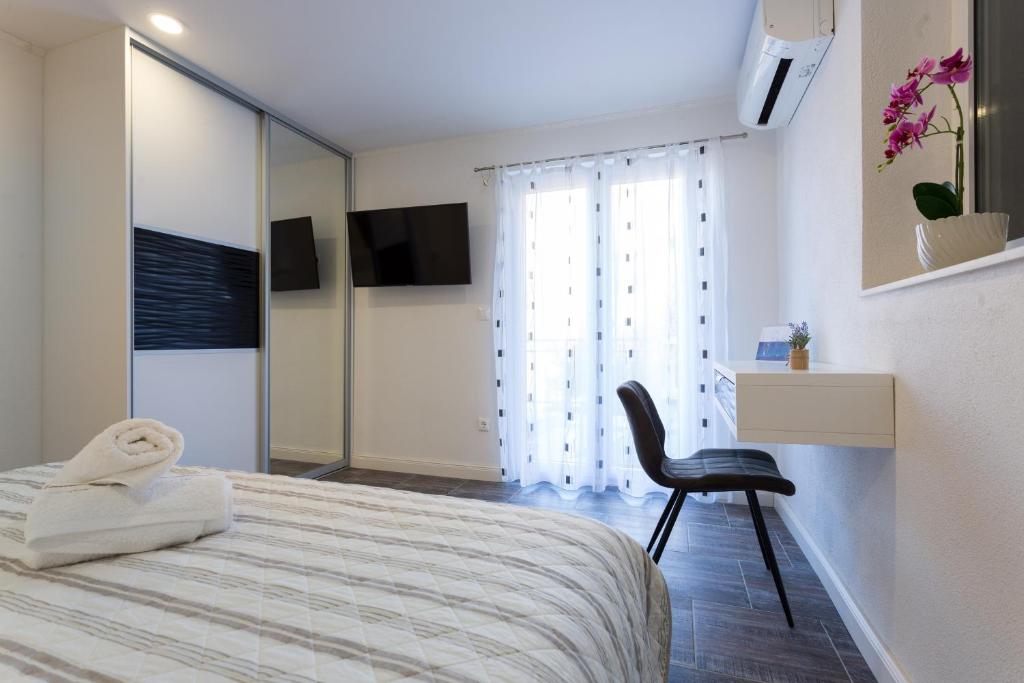 Posteľ alebo postele v izbe v ubytovaní Sedra Home