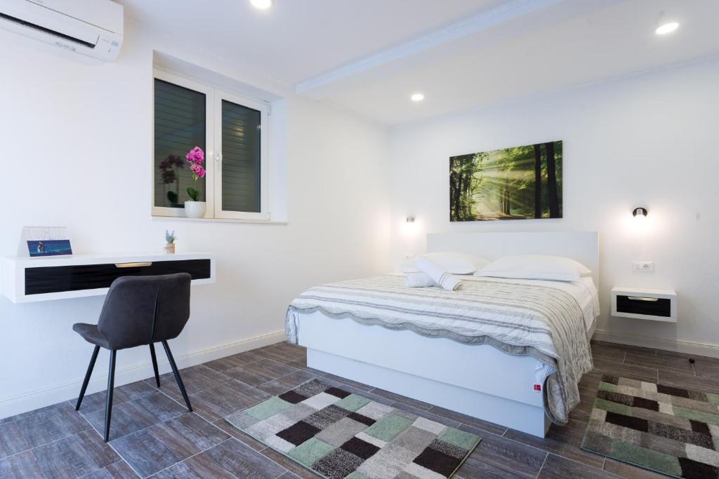 Posteľ alebo postele v izbe v ubytovaní Sedra Home