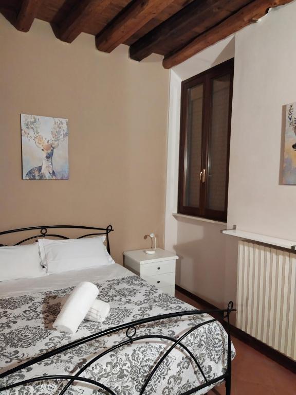 Postel nebo postele na pokoji v ubytování Carducci 49
