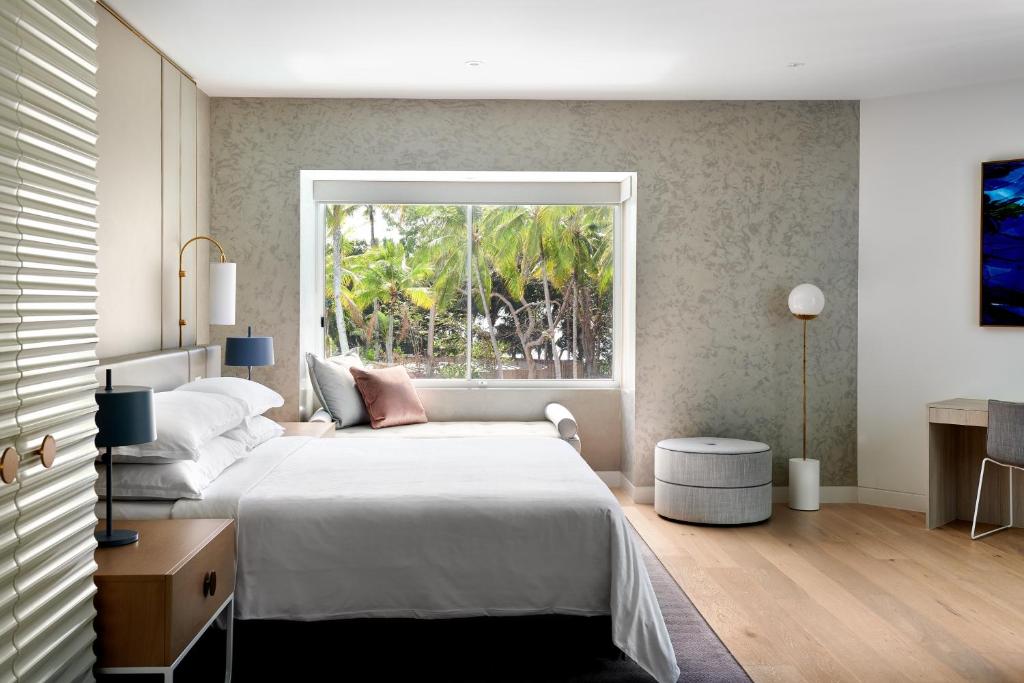 Postel nebo postele na pokoji v ubytování Sheraton Grand Mirage Resort, Port Douglas