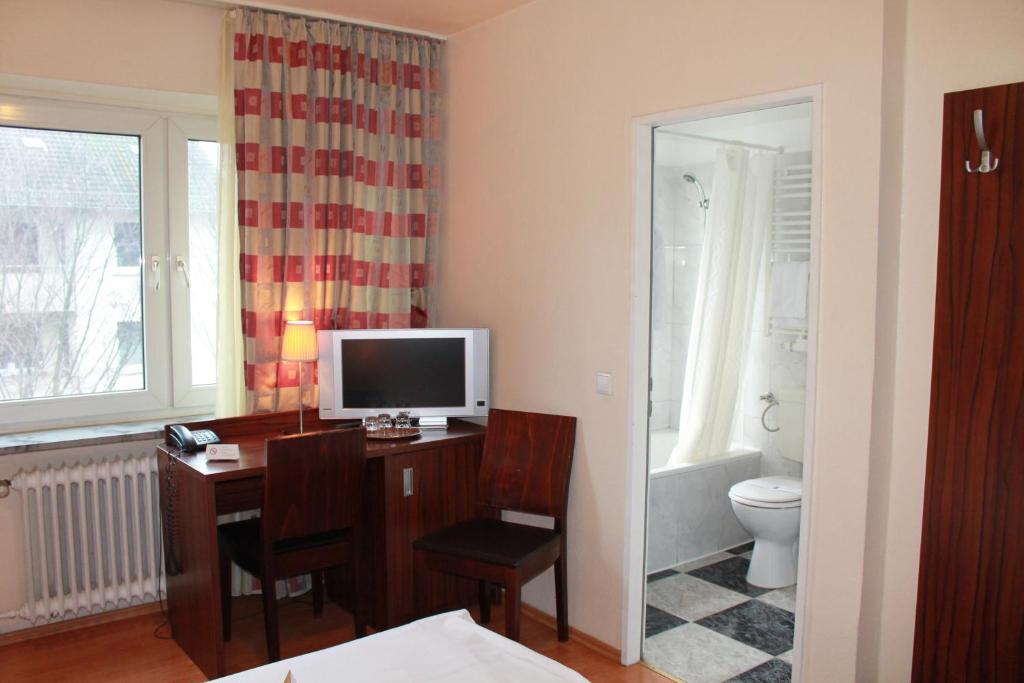 Koupelna v ubytování City Hotel Mercator