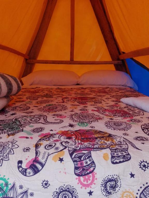 Postel nebo postele na pokoji v ubytování VALLE DE LAS CECROPIAS