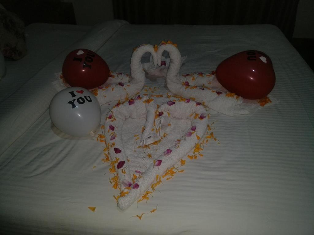 Postel nebo postele na pokoji v ubytování Hotel hornbill