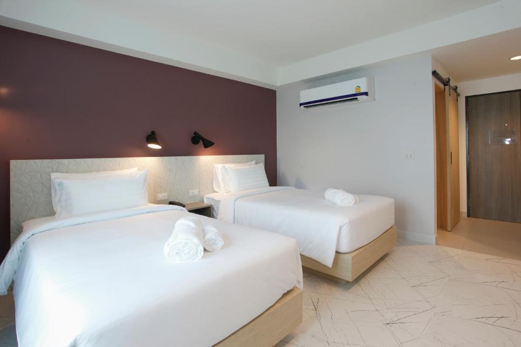 Postel nebo postele na pokoji v ubytování Port Canary Airport Hotel