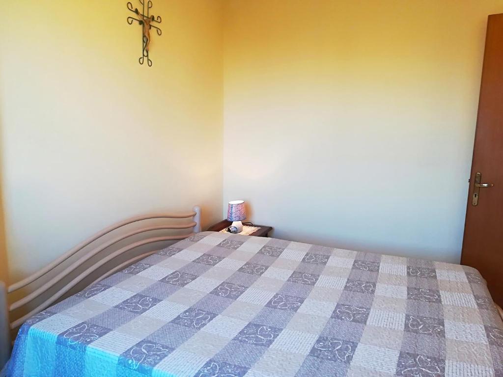 A bed or beds in a room at Near The Beach And The Center Of Otranto - Apartment Eleonora 5 Places