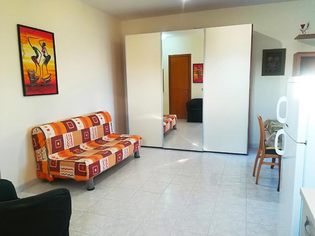 A seating area at Near The Beach And The Center Of Otranto - Apartment Eleonora 5 Places