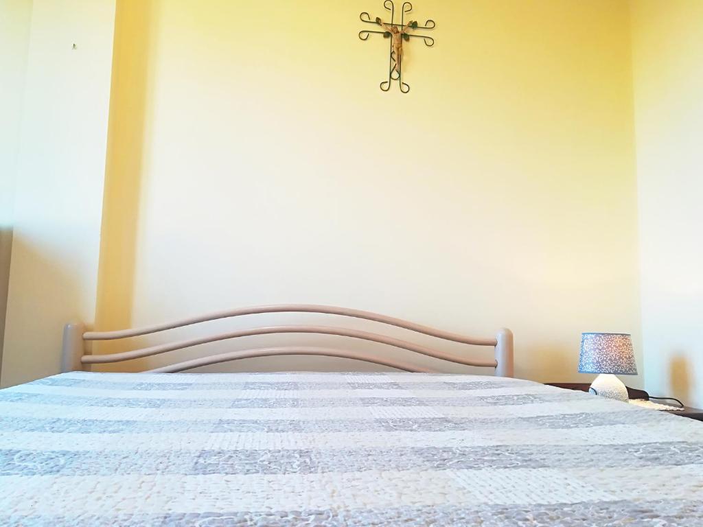 A bed or beds in a room at Near The Beach And The Center Of Otranto - Apartment Eleonora 5 Places