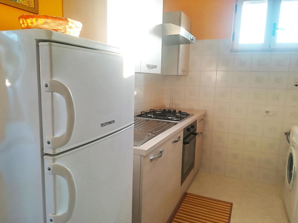 A kitchen or kitchenette at Near The Beach And The Center Of Otranto - Apartment Eleonora 5 Places