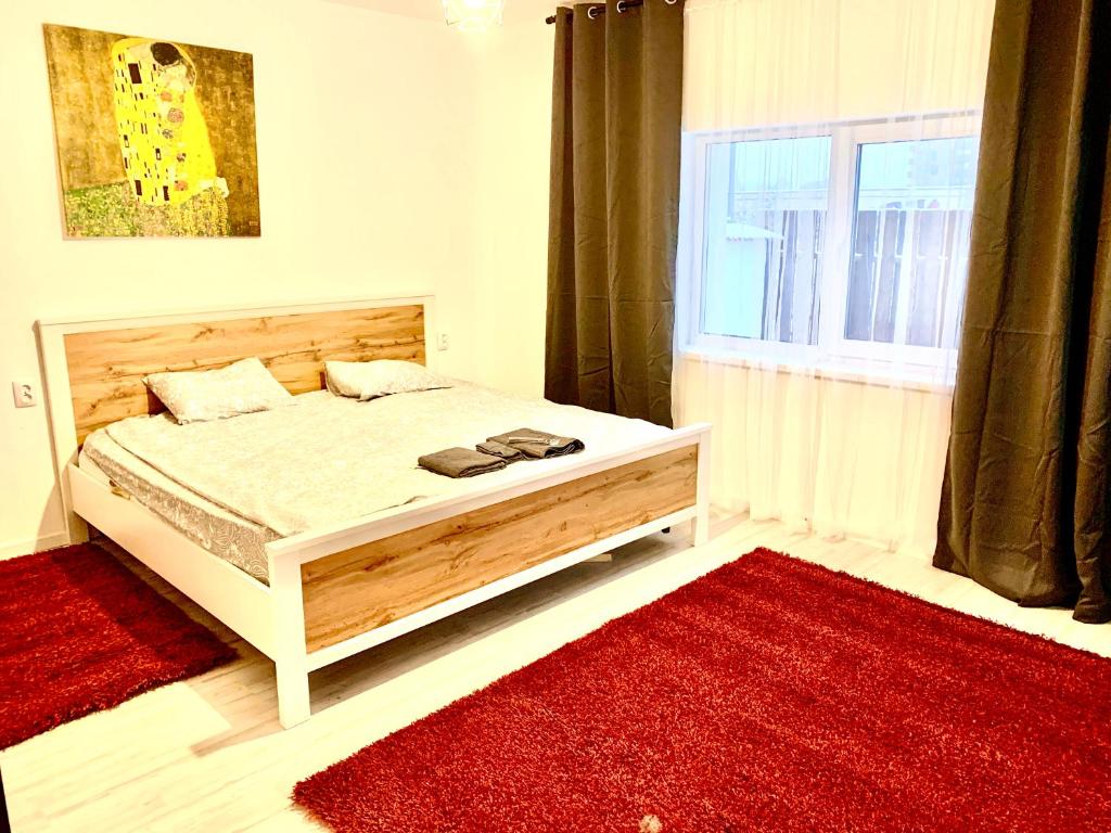 Tempat tidur dalam kamar di Vila ANA