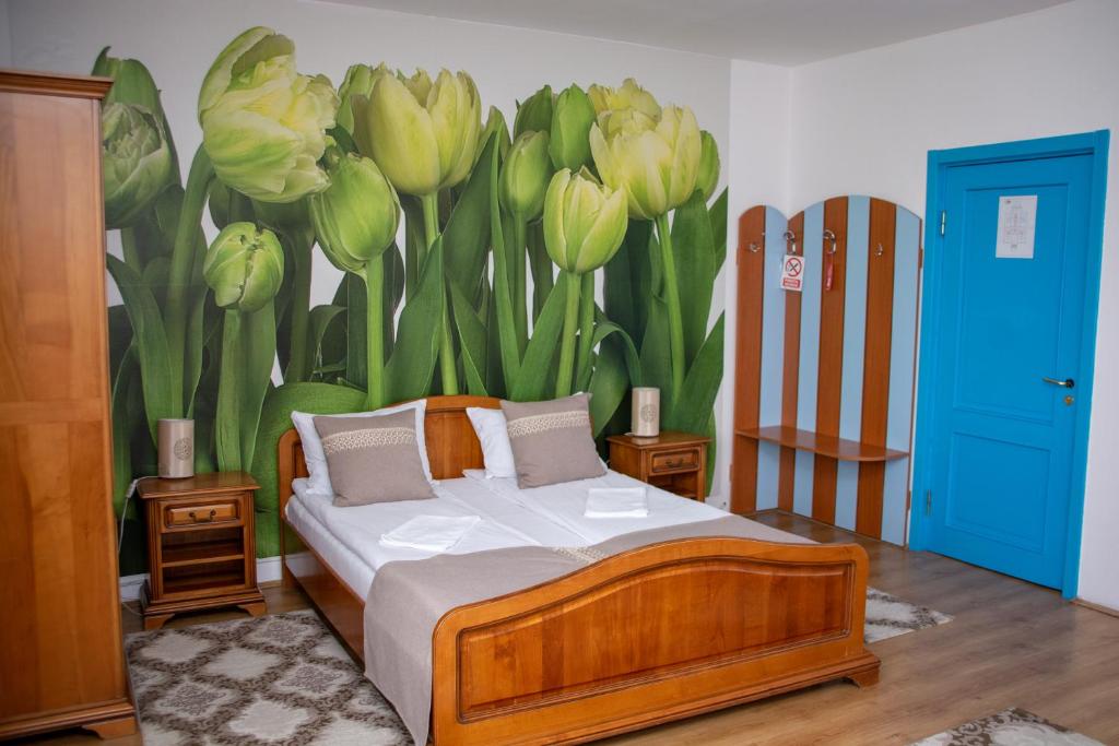 Postel nebo postele na pokoji v ubytování Motel Via Targu Mures
