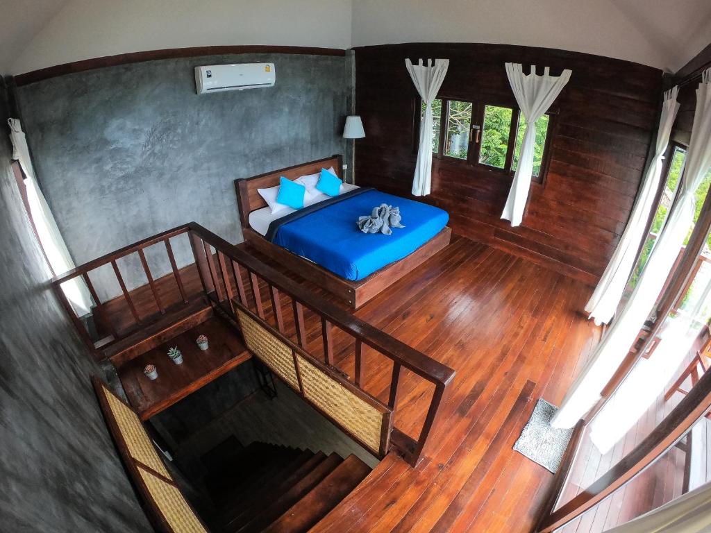 Postel nebo postele na pokoji v ubytování Blue Heaven Resort Koh Tao