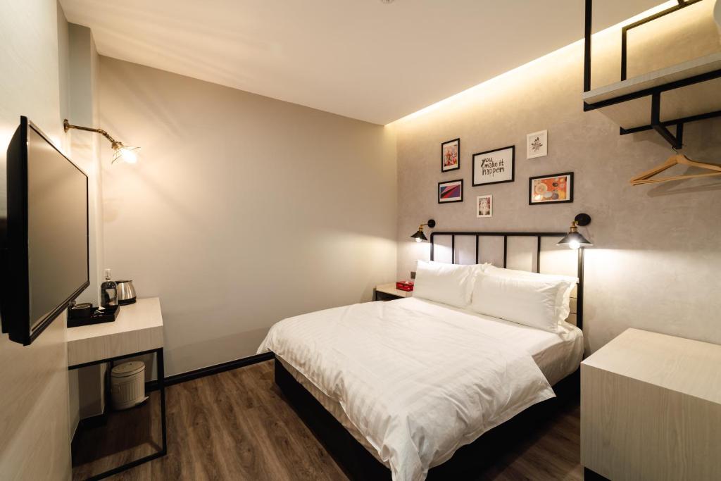Postel nebo postele na pokoji v ubytování SVOK Hotel