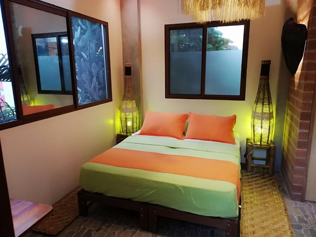 Postel nebo postele na pokoji v ubytování Hostal Oloncito