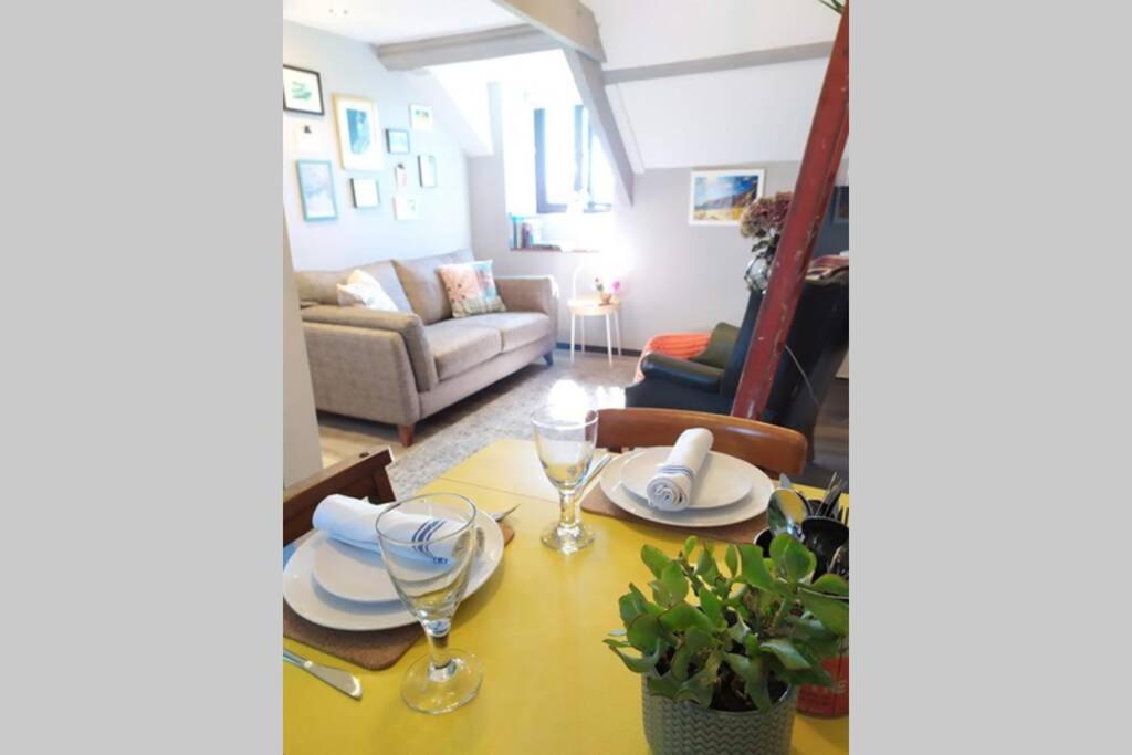 Posezení v ubytování Hayloft Cottage