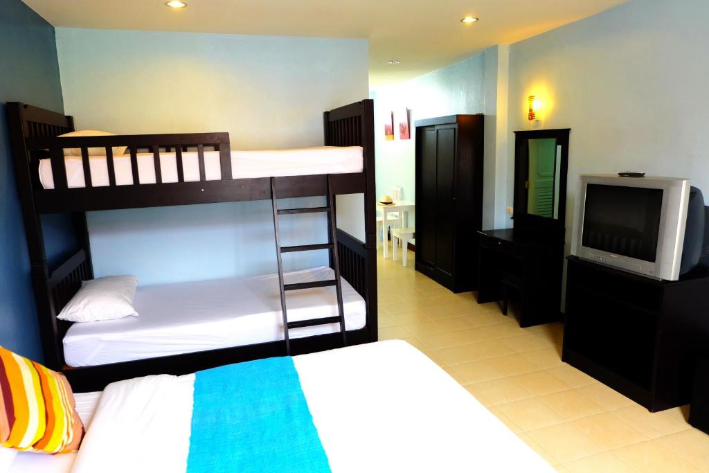 Postel nebo postele na pokoji v ubytování Baan Nilawan Hua Hin Hotel