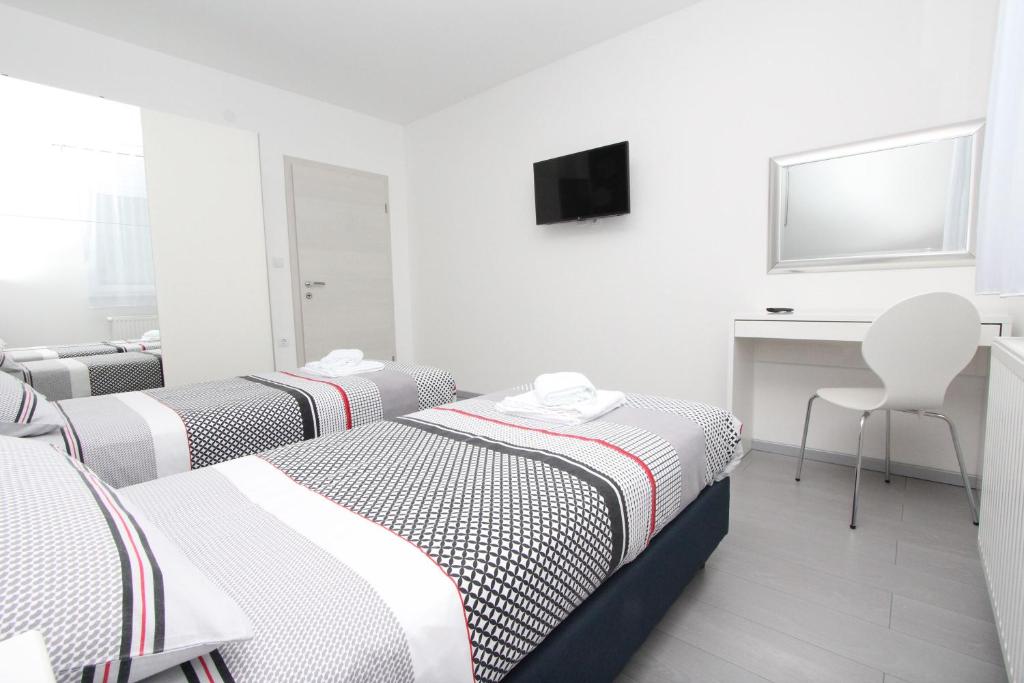Posteľ alebo postele v izbe v ubytovaní Apartment Karlo 1