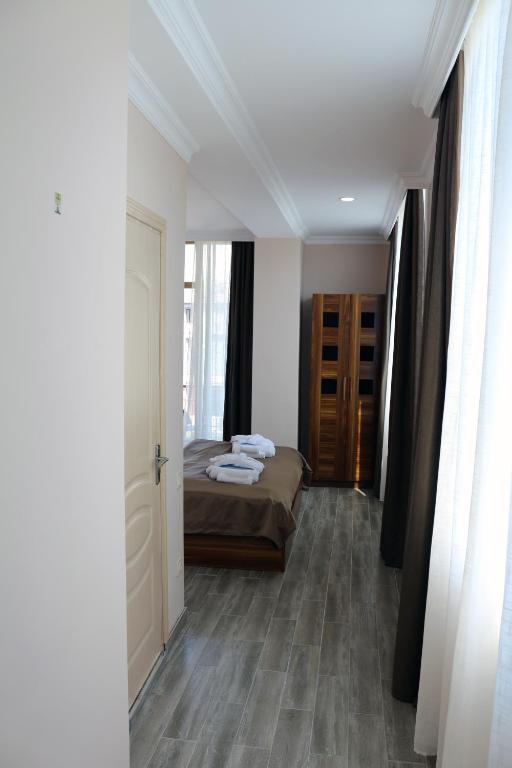 Postel nebo postele na pokoji v ubytování Hotel Lazi