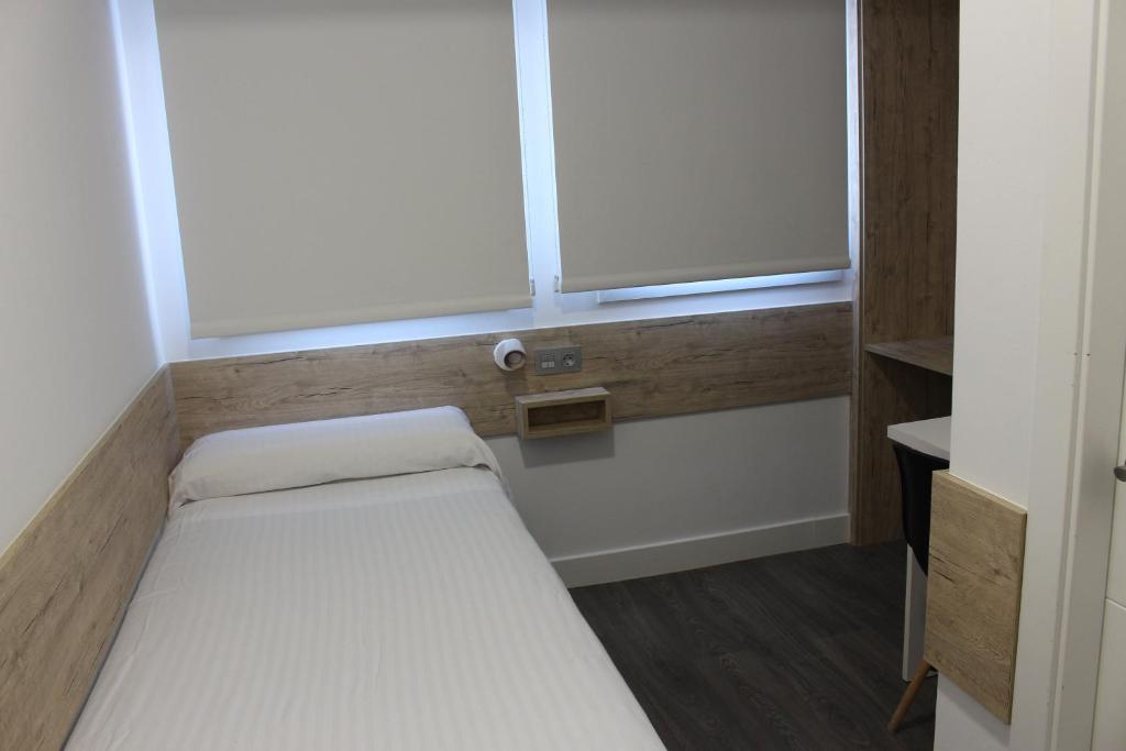 Postel nebo postele na pokoji v ubytování Deluxe Hostels & Suites Merida