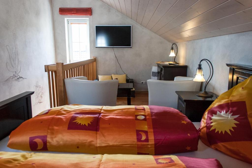 Postel nebo postele na pokoji v ubytování Cleo´s Hotel Kallstadt