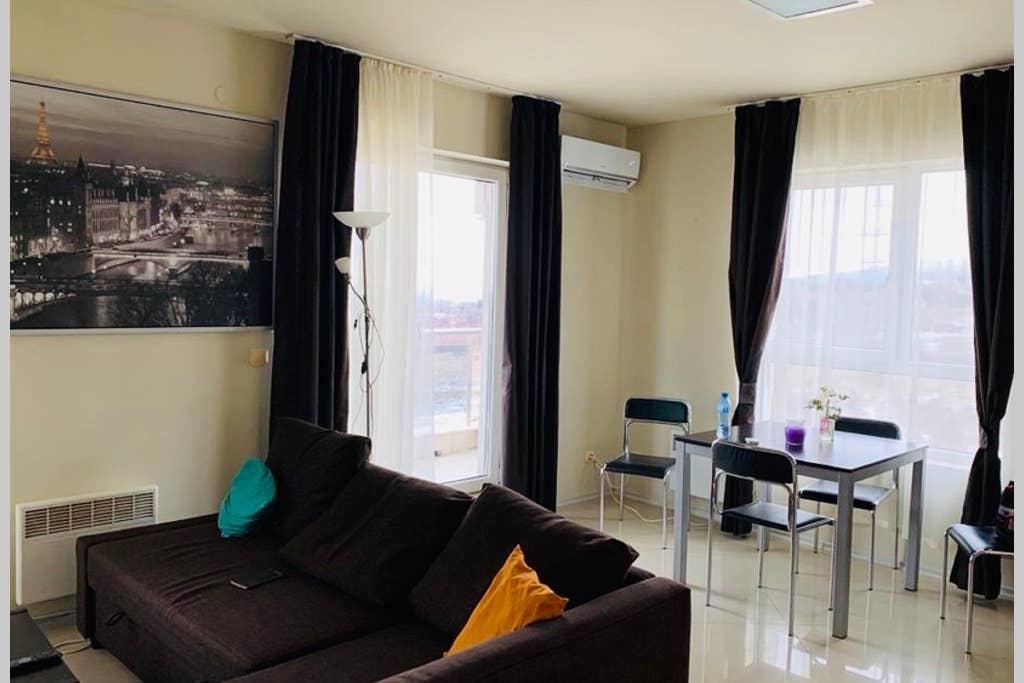 Orchidea 1 Bedroom Apartment tesisinde bir oturma alanı