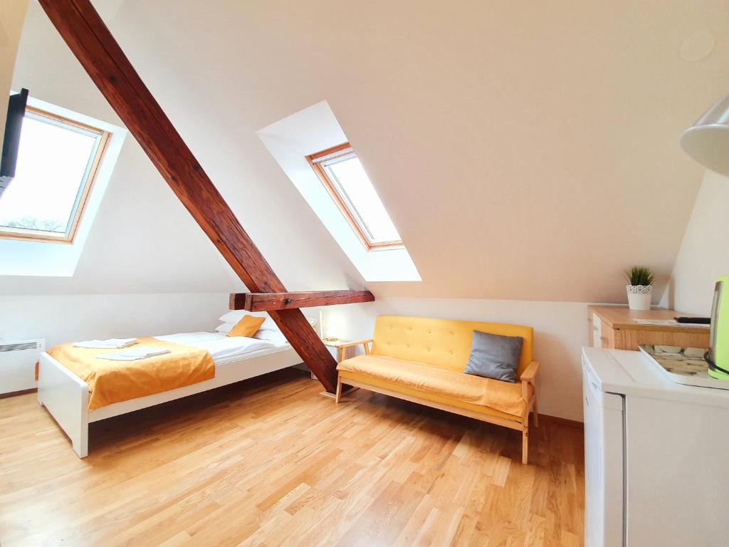 Postel nebo postele na pokoji v ubytování B&B Vila Teslova