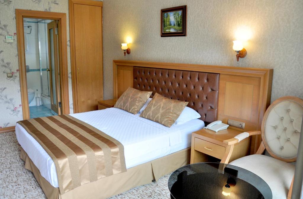 Postel nebo postele na pokoji v ubytování Örsmaris Boutique Hotel