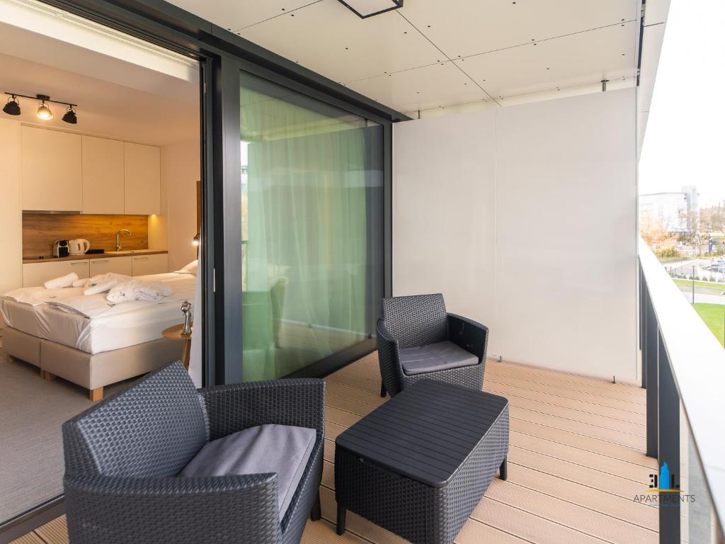 Posteľ alebo postele v izbe v ubytovaní 3L Apartments Seaside Park